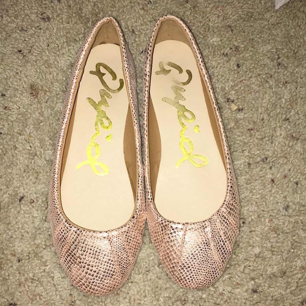 Rose gold snakeskin flats